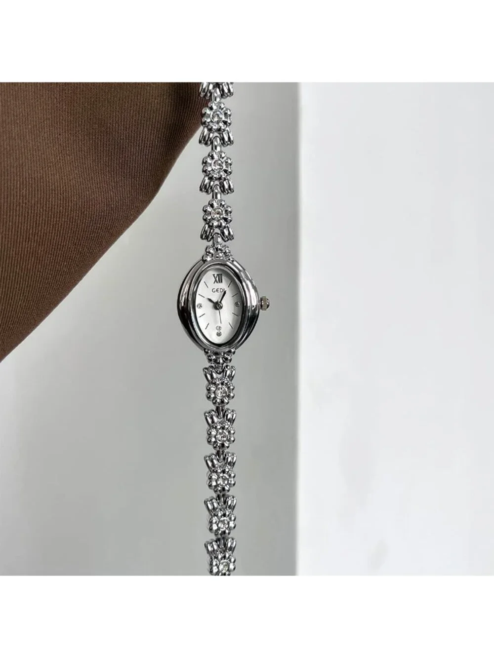 Women's White Silver Analog Quartz Alloy Steel Oval Roman Numeral Bracelet Watch
